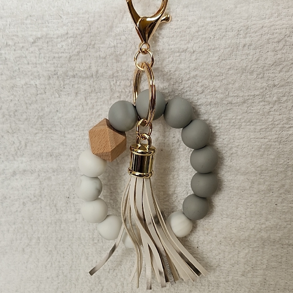 Gray and White Beaded Keychain with Gold Accents